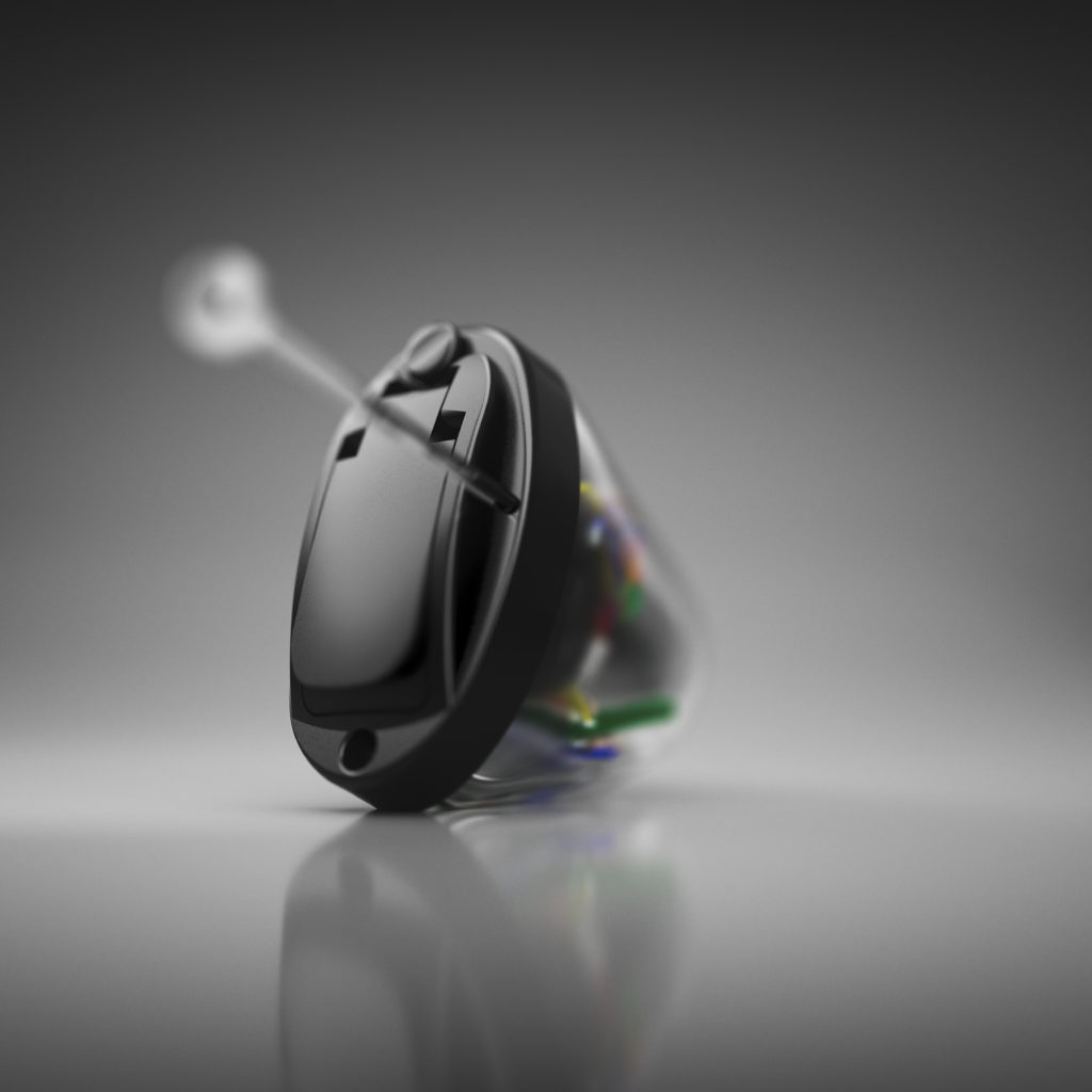 Oticon_Opn_IIC_Nahaufnahme Modernes Hörgerät mit durchsichtigem Gehaäuse